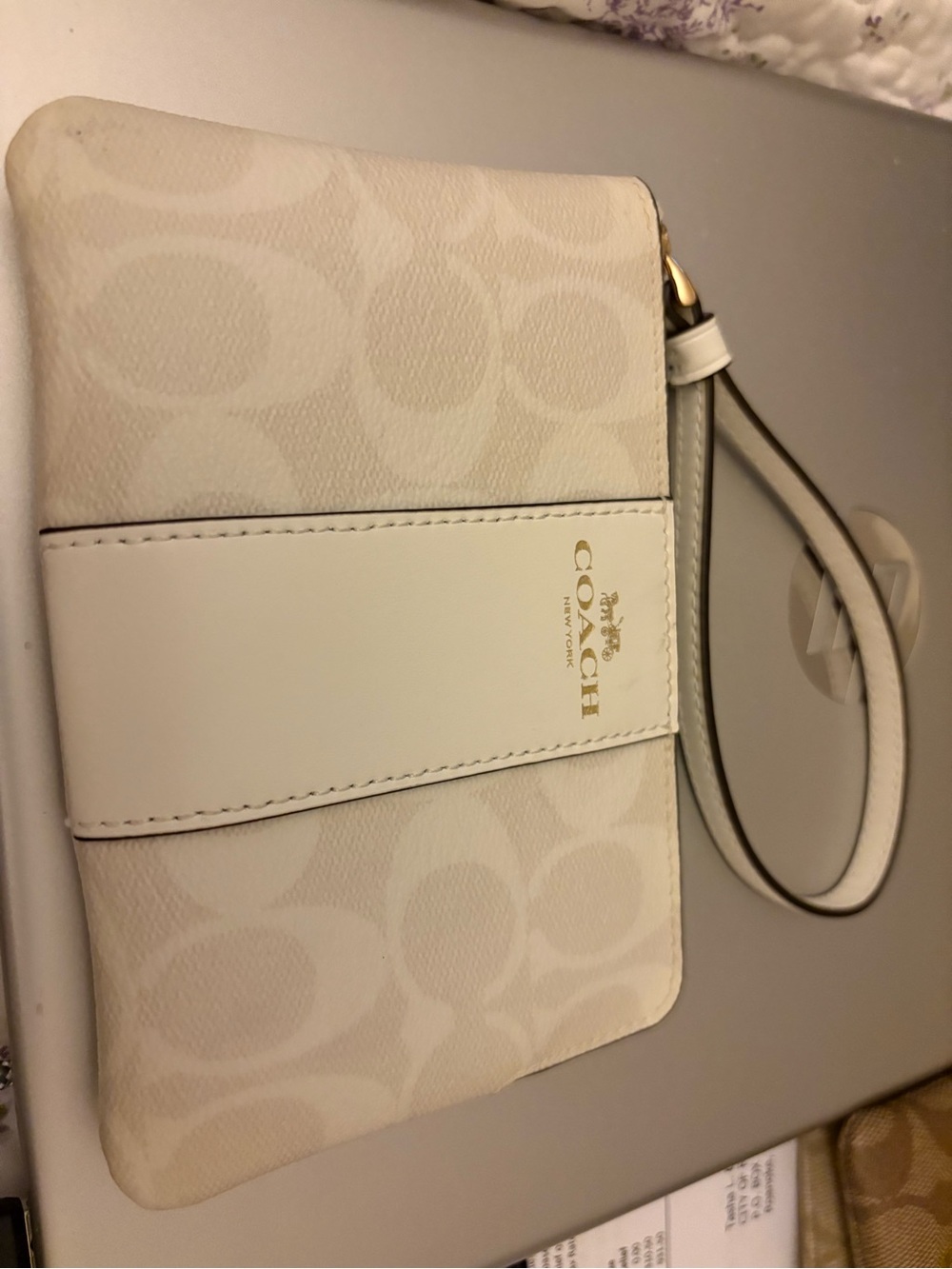 Coach Chalk tan Signature Wristlet with Gold Logo